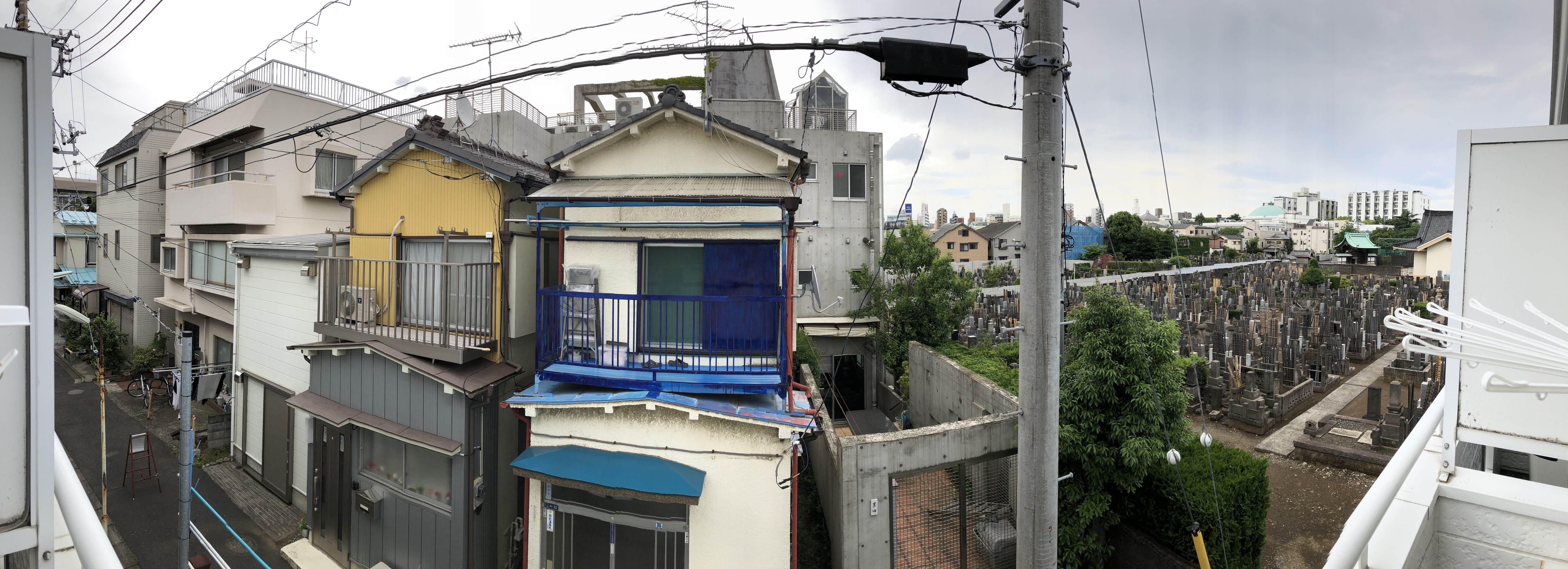 (Caption) And a look from the balcony. Yeah, I suppose the nights will be fairly quiet over here, I especially don’t suspect any noises ever coming from the right side of the photo.